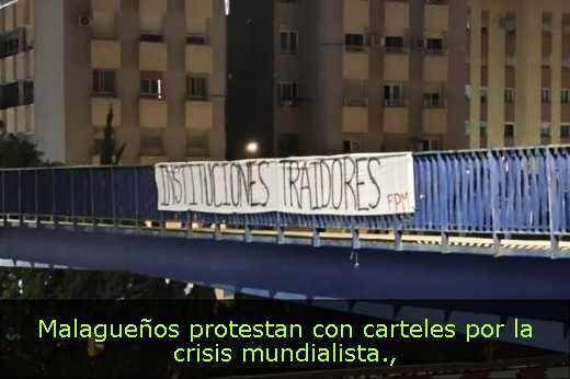 Malagueños protestan con carteles por la crisis mundialista